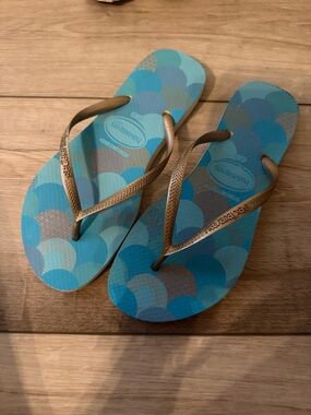 Havaianas Blue Flip Flops with Orange Metallic Accents